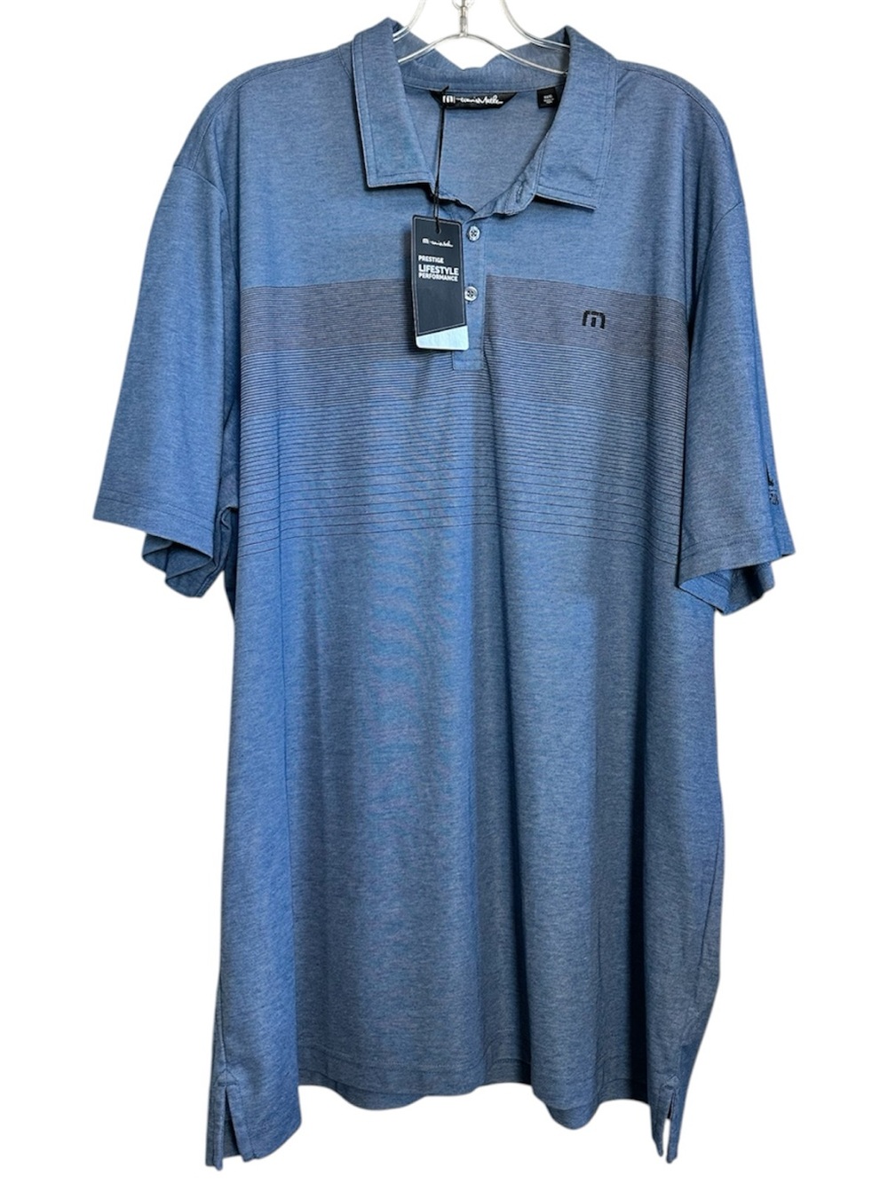 Travis Mathew Blue Golf Polo with Subtle Black Stripe